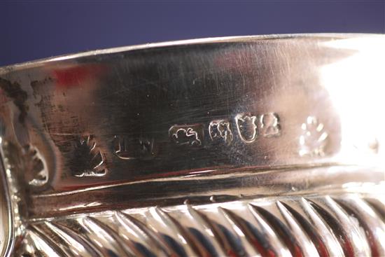 An early 19th century provincial demi spiral fluted silver porringer, 6 oz.